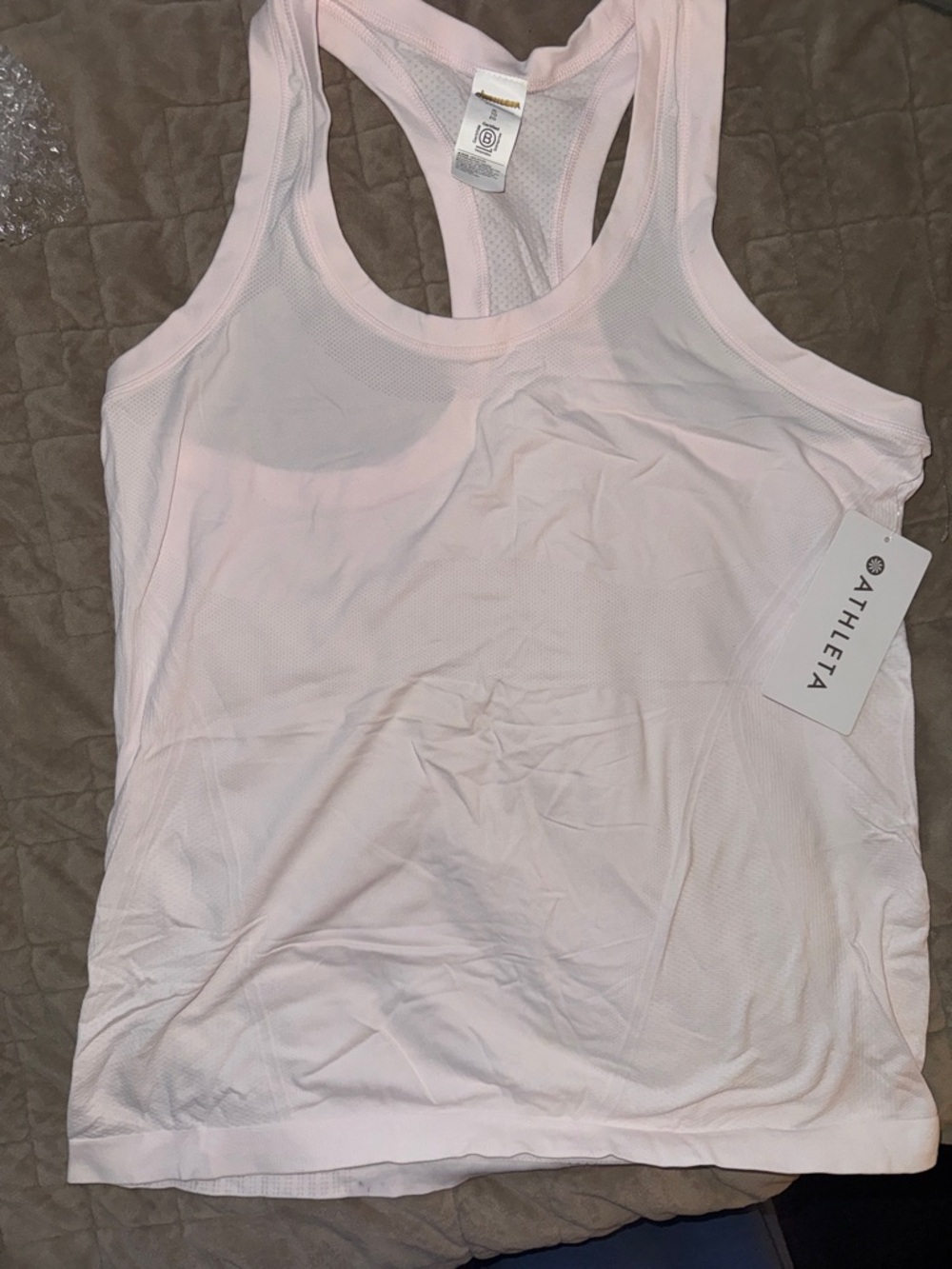 Athleta Pale Pink Racerback Performance Tank XL dark spots on last three photos
